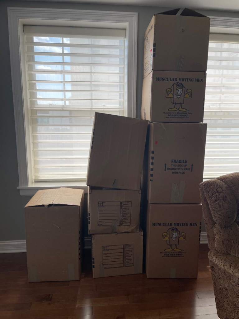 Photo by Jeremy Goldbach of Muscular Moving Men - Large