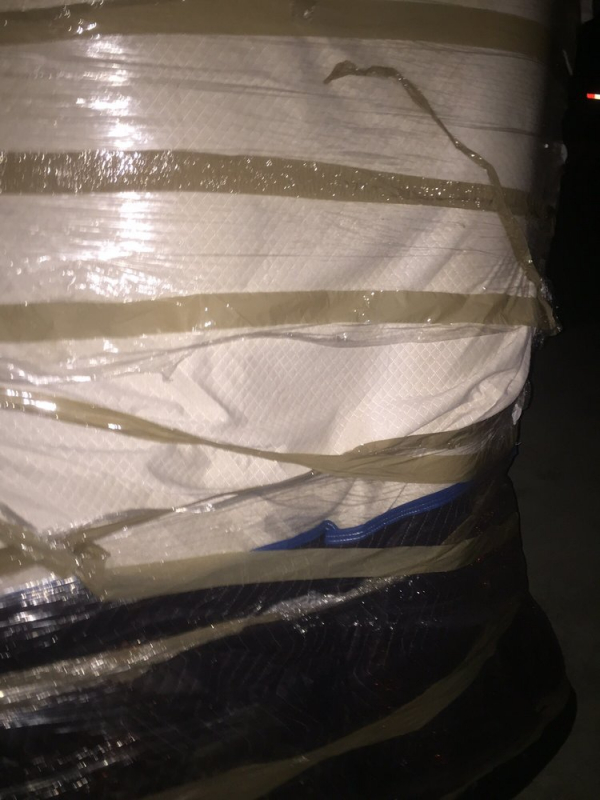 Photo by Eftihia Rivas of Moving Pros Inc - Large