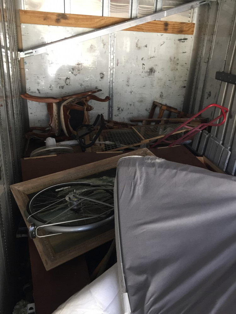 Photo by Linda Sarvey of Moving Staffers - Large