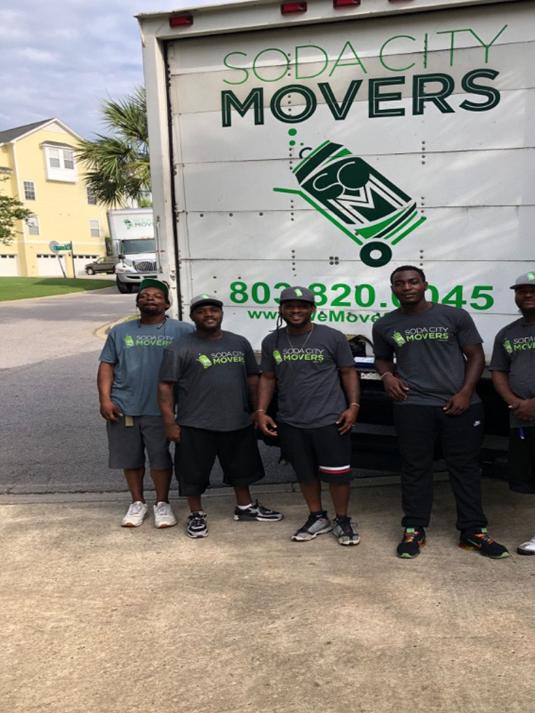 Second photo by Elane Tipton of Soda City Movers - Large