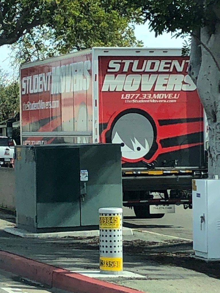 Second photo by Julian Lepage of The Student Movers - Large