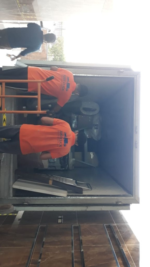 Second photo by Kathleen Aura of Just Click Movers - Large