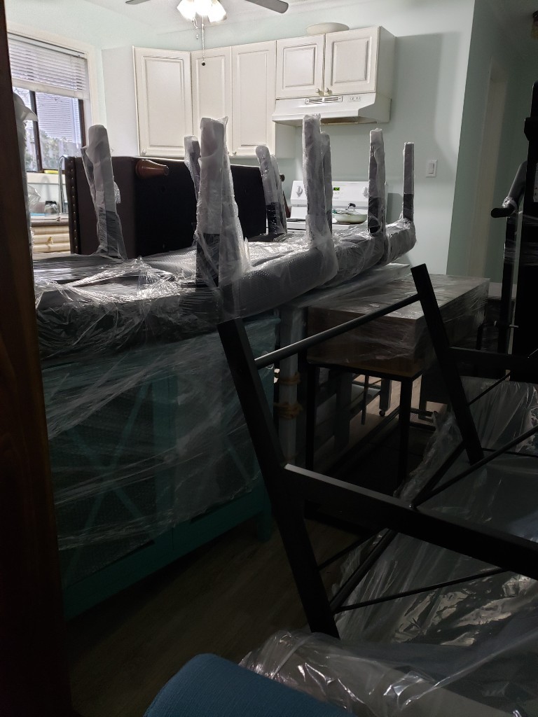 Photo by Michel Demyen of 2 Burley Men Moving - Large