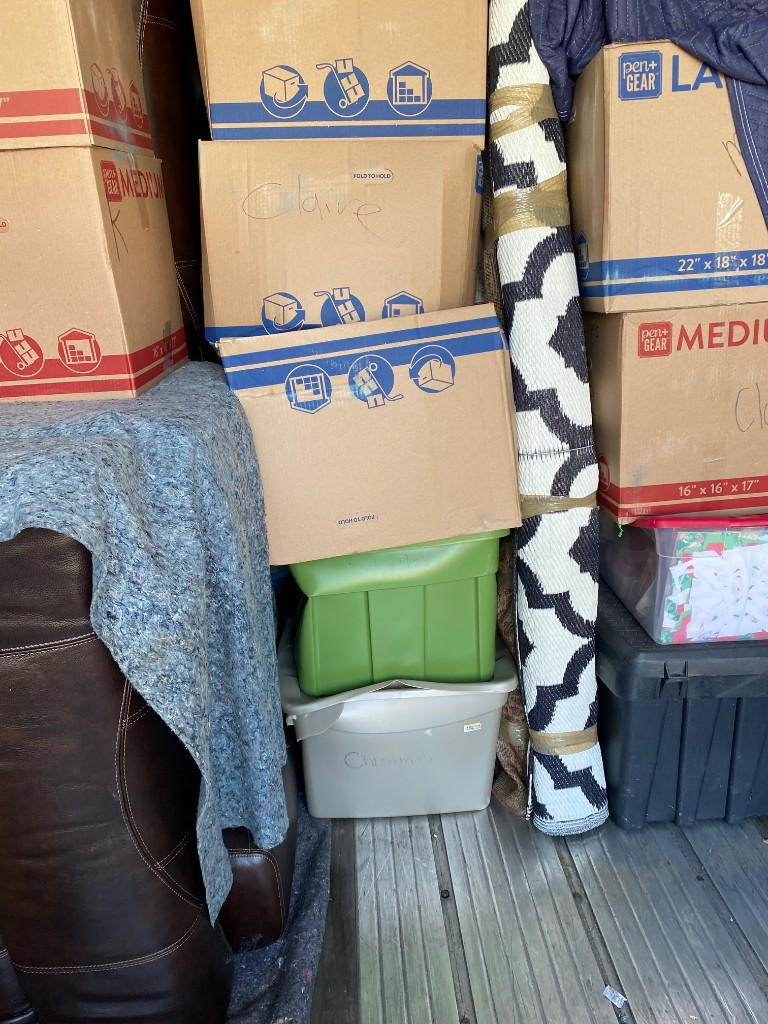 Second photo by Robyn Miley of Moving Staffers - Large