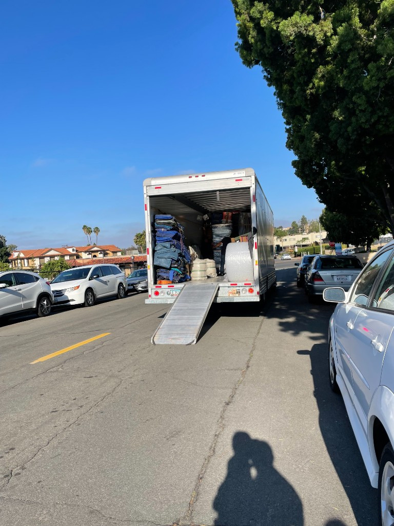 Photo by Clare Vaterlaus Bird of Visions Moving & Storage - Large