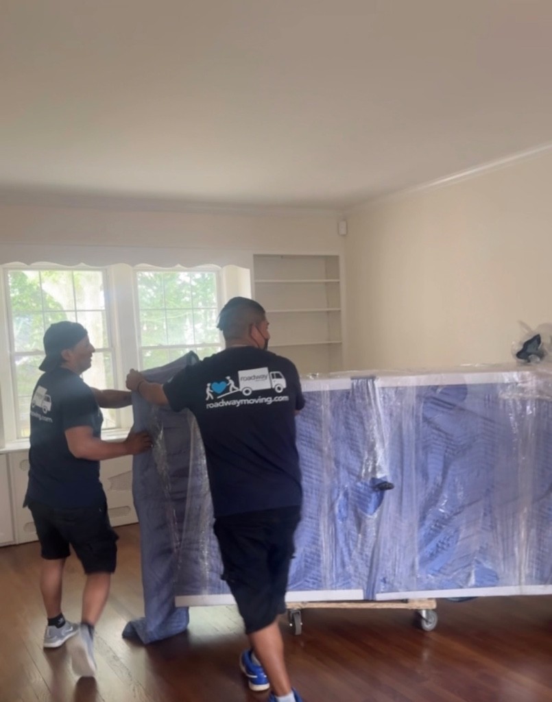 Second photo by Rachel Perlman of Roadway Moving - Large