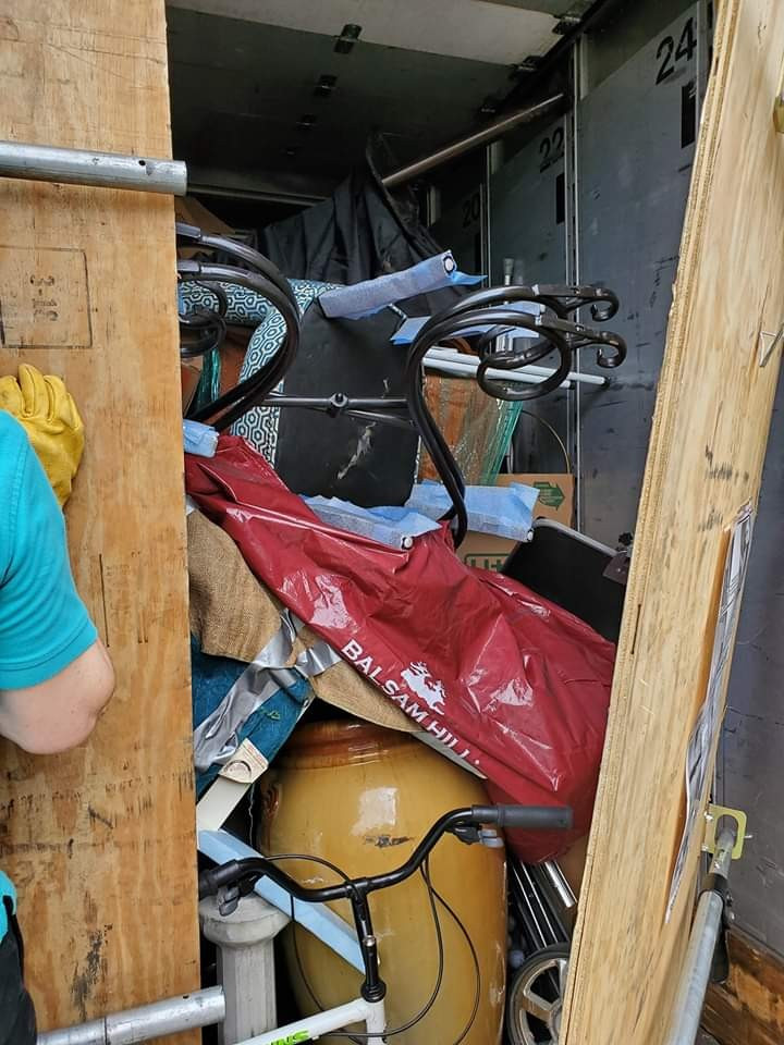 Second photo by Andrea Yaudas of Moving Staffers - Large