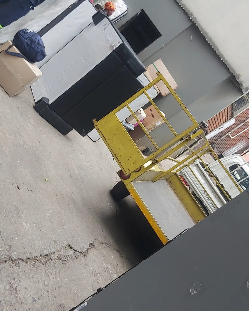 Photo by Sean Rampling of Home and Office Movers - Large