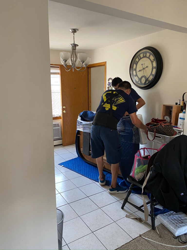 Second photo by Javier Vazquez of Moovers Chicago Inc - Large