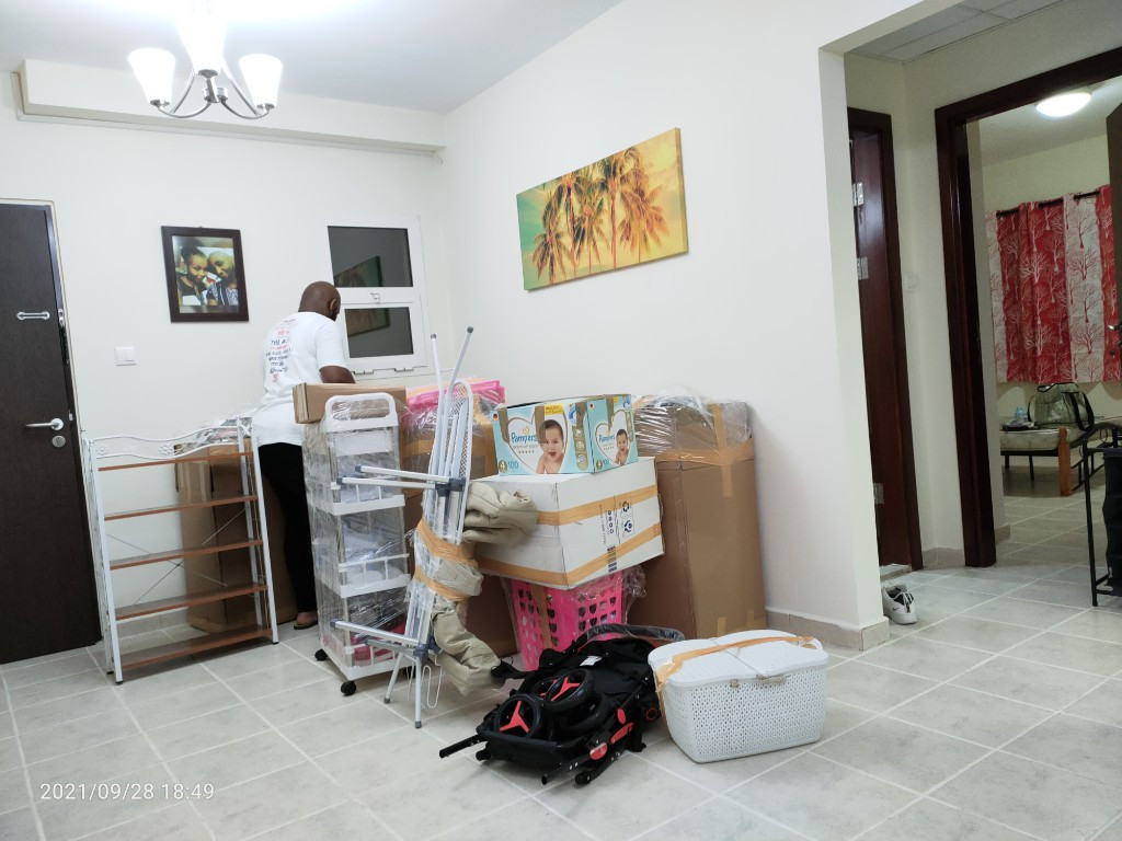 Second photo by Dennis Kilonzo of Discount Movers - Large