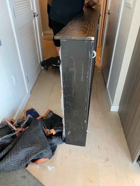 Second photo by Ana Caceres of Orange Movers - Large