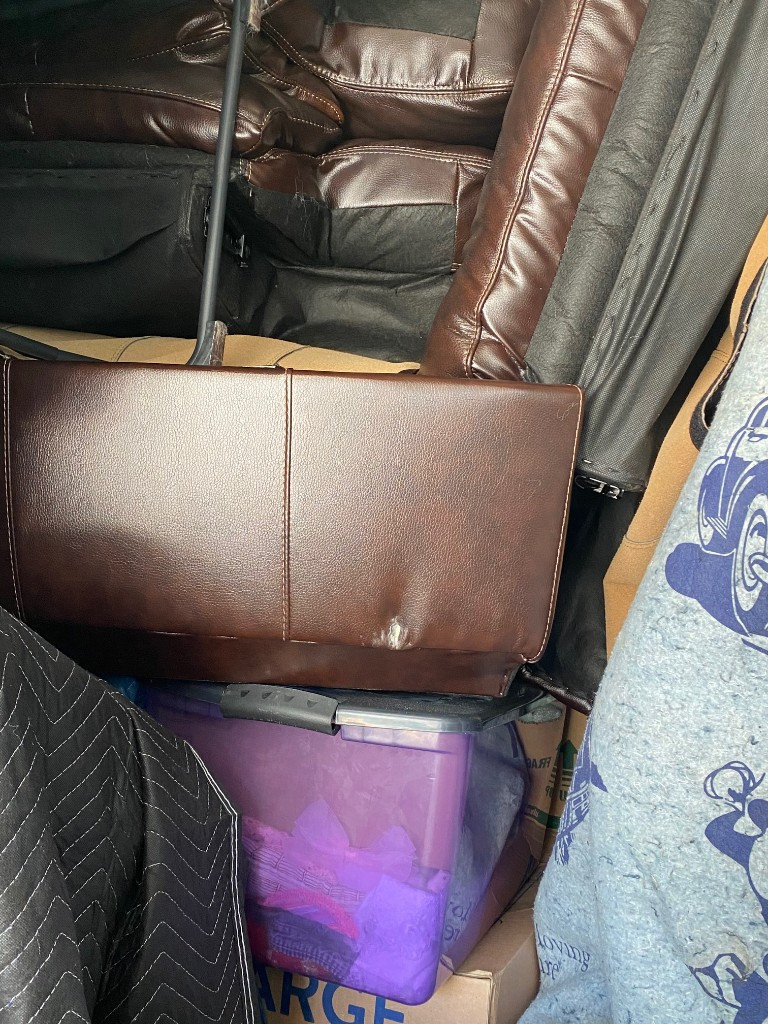 Photo by Robyn Miley of Moving Staffers - Large