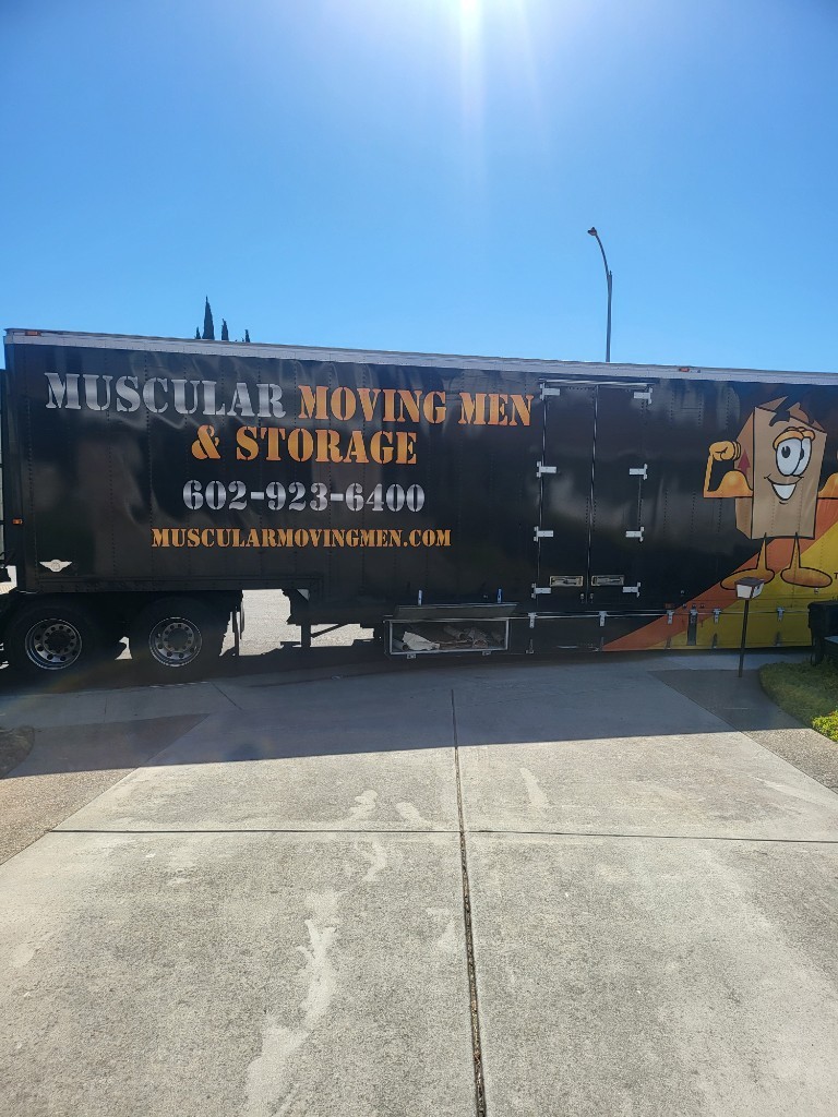 Photo by Tony Wragg of Muscular Moving Men - Large