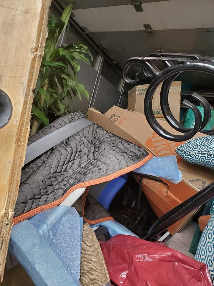 Photo by Andrea Yaudas of Moving Staffers - Large