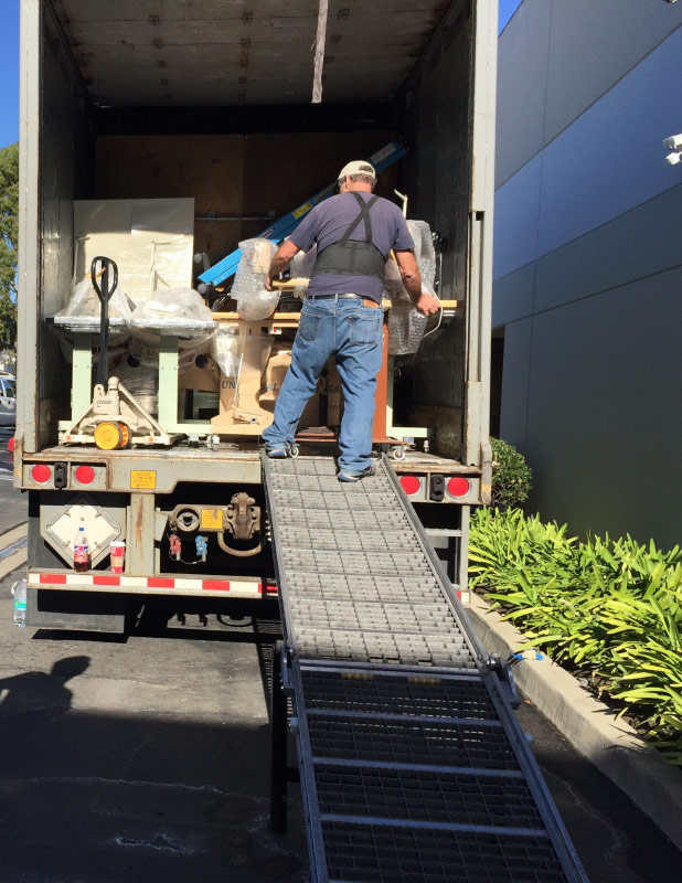 Photo by Bernadette Swanson of Moving Staffers - Large