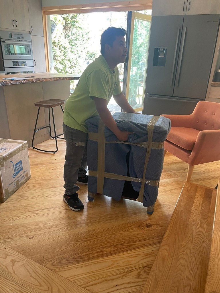 Second photo by Carrie Patterson Besler of Century Moving Services - Large