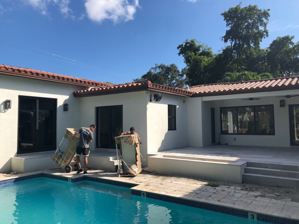 Second photo by Mia Growin of Miami Movers For Less - Large