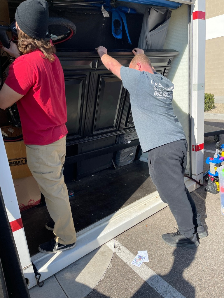 Second photo by Tiffanie Hedman of Moving Staffers - Large