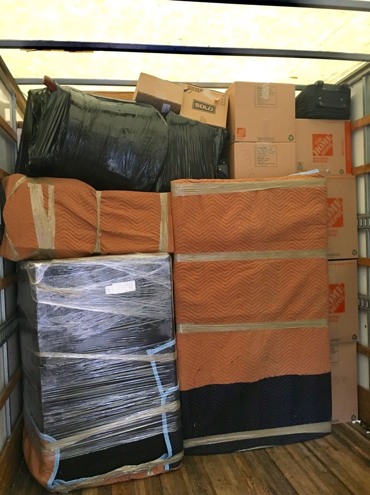 Second photo by Julio Renwa of East Coast Moving Inc - Large