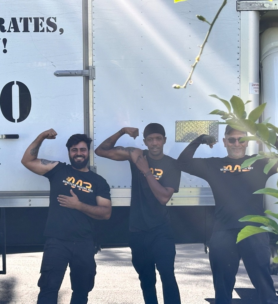 Photo by Carol S Perry of Muscular Moving Men - Large