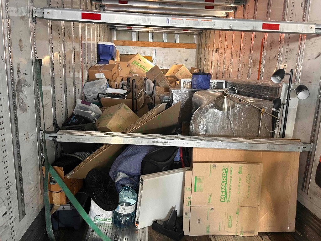 Second photo by Vicky Skaff of College Muscle Movers - Large