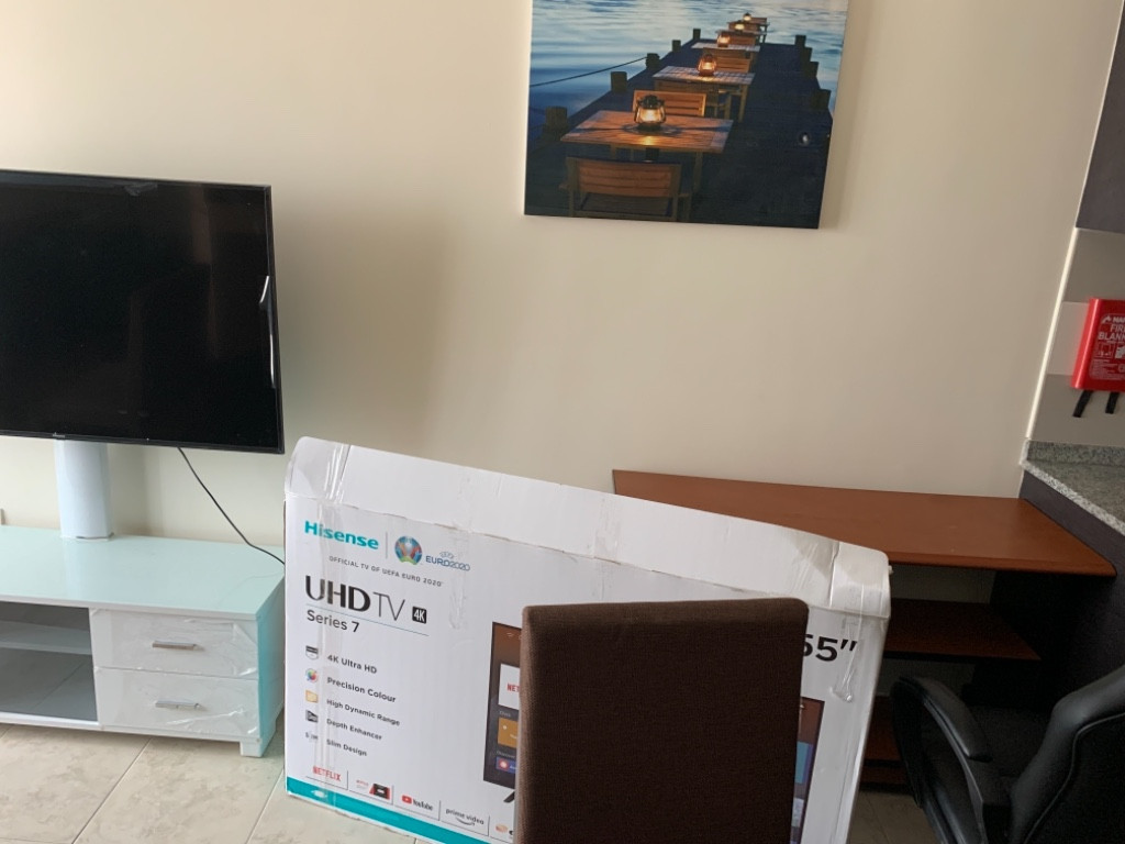 Second photo by Adetola Gbenro of Discount Movers - Large