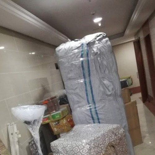 Second photo by Ikram Khan of Discount Movers - Large