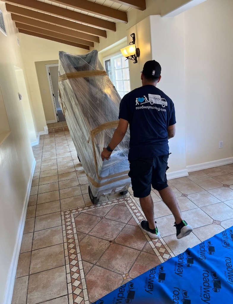 Second photo by Ugo Mozie Ii of Roadway Moving - Large