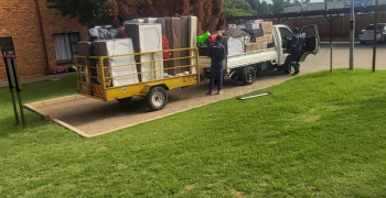 Second thumbnail photo by Sean Rampling of Home and Office Movers