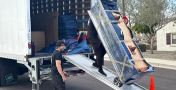 Second thumbnail photo by Chris Naude of Muscular Moving Men