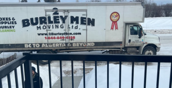 Thumbnail photo by Lori Sider of 2 Burley Men Moving