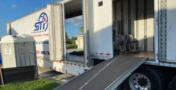 Thumbnail photo by Michael Tatelbame of STI Moving and Storage