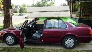 Moving a mattress is quite a challenge.